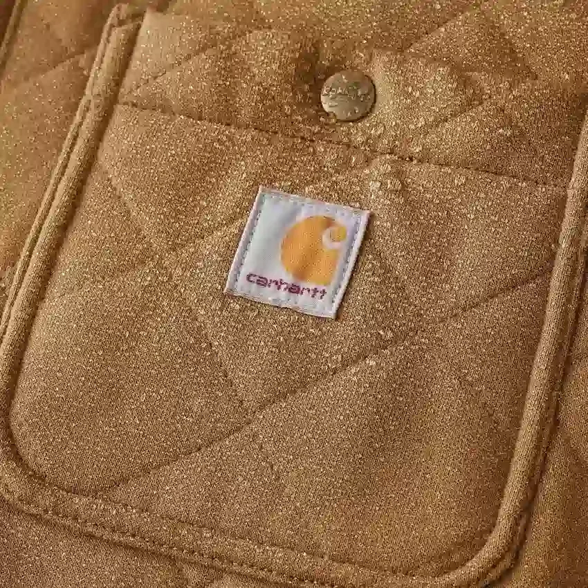 Rain Defender® locker sitzende, schwergewichtige, gesteppte Hemdjacke mit Druckknöpfen vorne